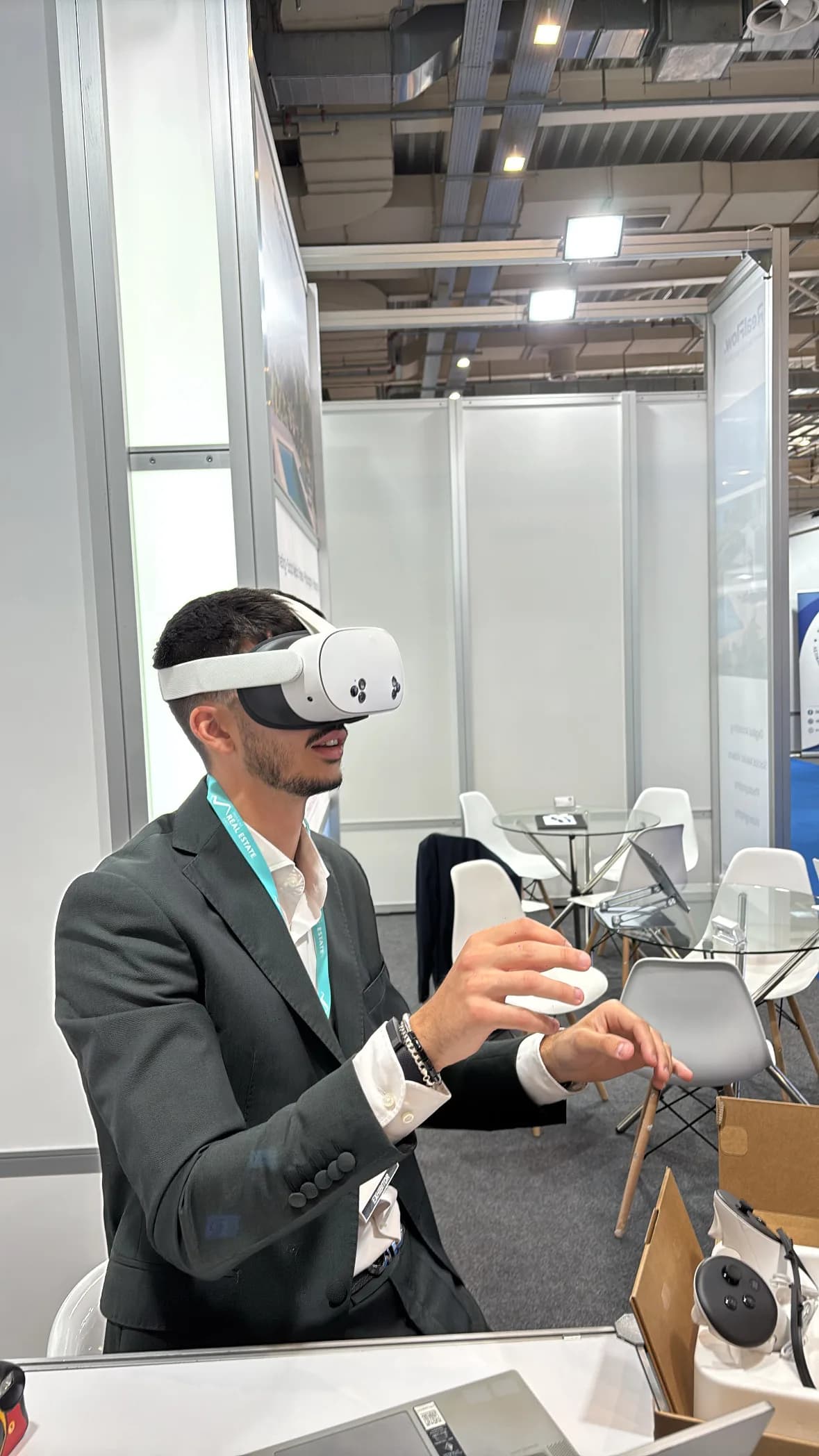 Man wearing a virtual reality headset in a property showroom