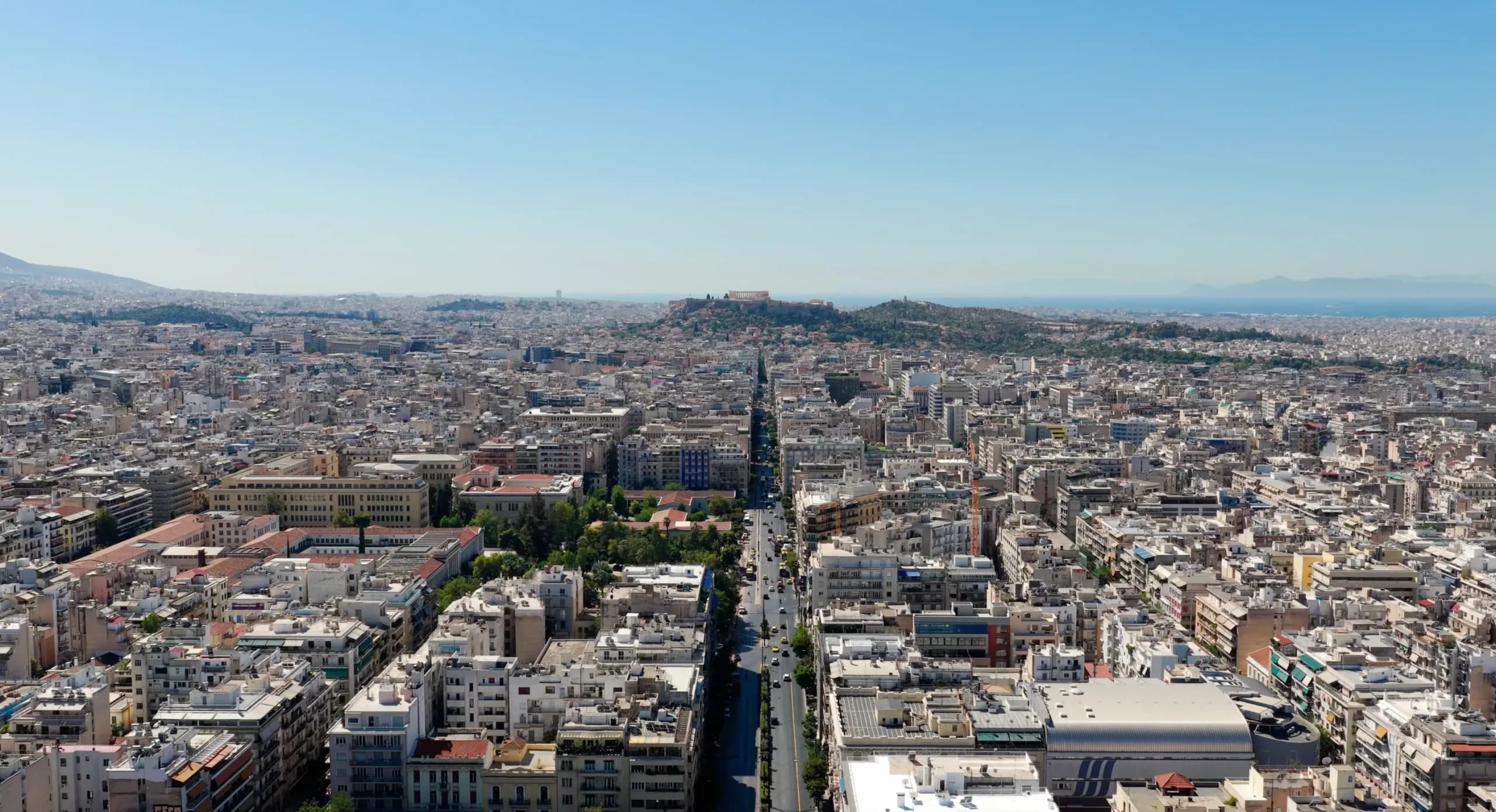 Athens city skyline from above with the Acropolis on the horizon